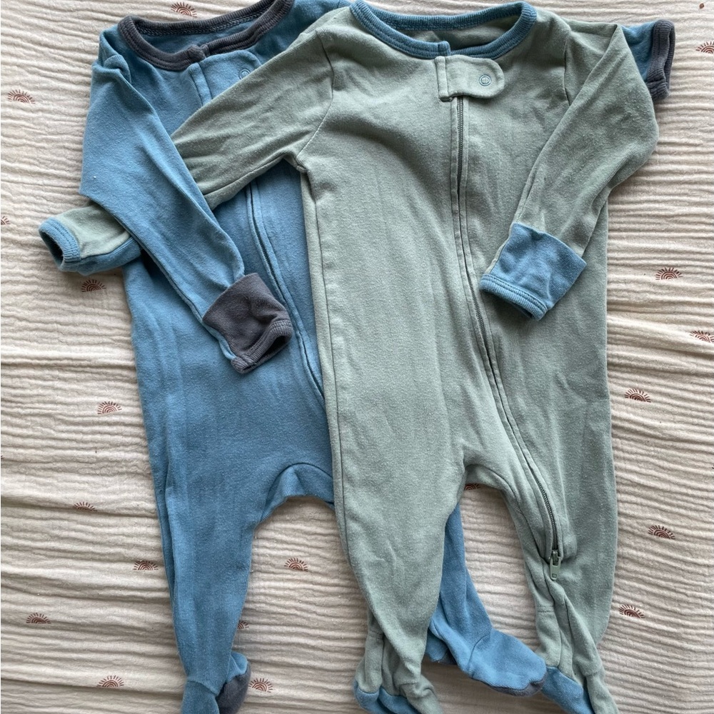 Two cloud island footie pajamas. Size 0-3 months